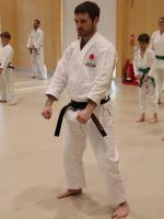 Simon Apen-Sadler performing rising block